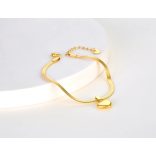 Плоска гривна от стомана със сърце златиста